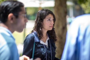 Attendees sitting at tables eating lunch at CNS Research Review, October 22, 2014, at CSE Courtyard, UCSD